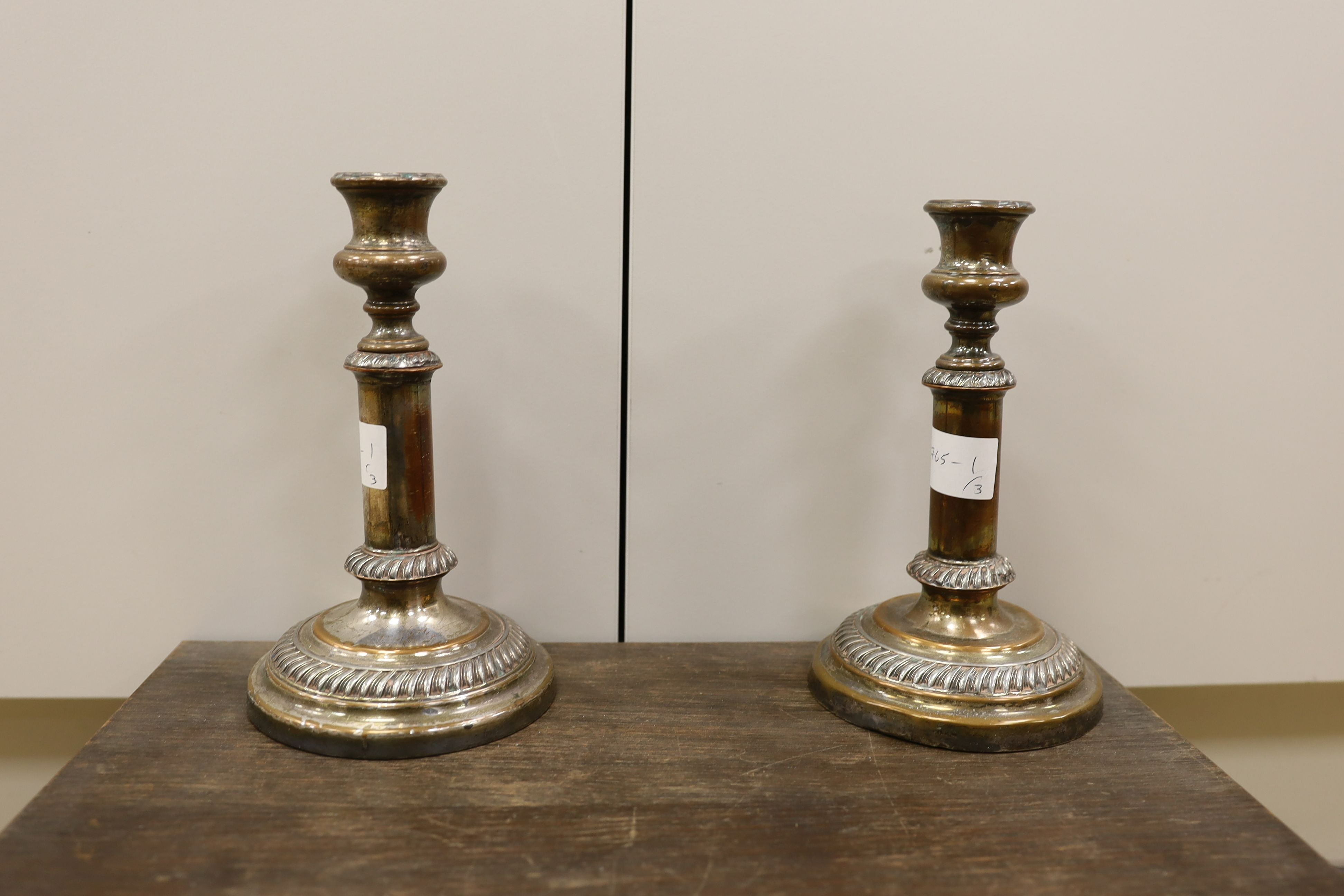 A pair of plated telescopic candlesticks and a Mappin & Webb part canteen of plated cutlery